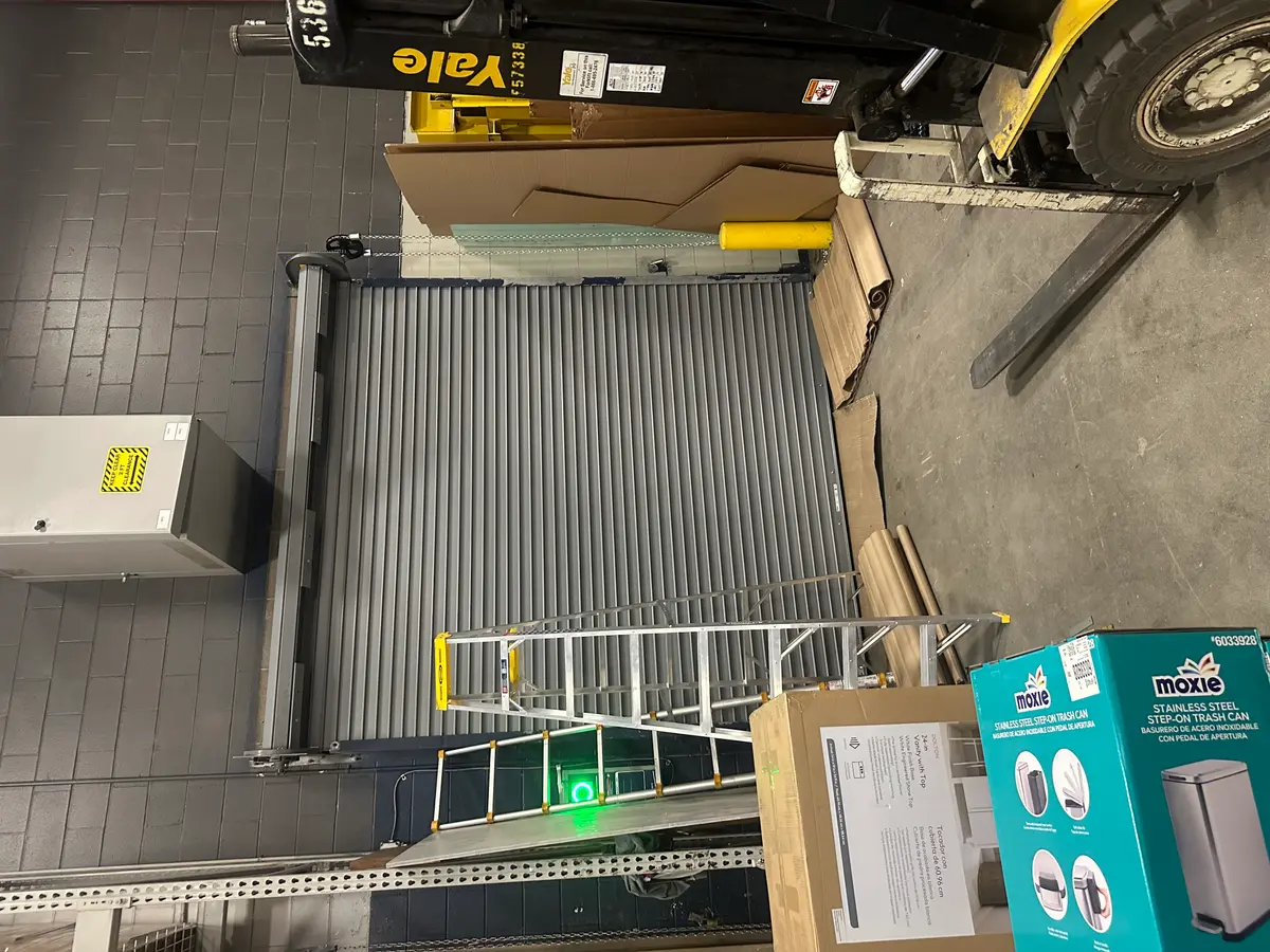 Completed commercial roll-up door installation in a warehouse